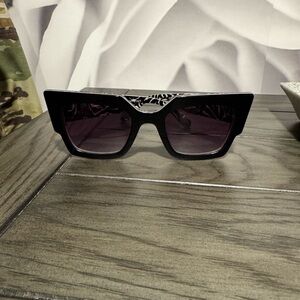 Sito Safari Chic Black Sunglasses with Unique Design on the inside.